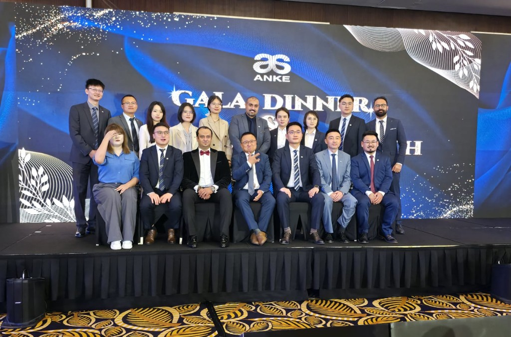 ANKE Gala Dinner — international colleagues celebrating together on stage.